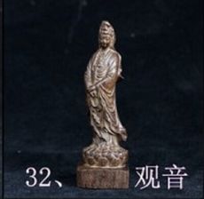 皮黑雕刻手把件